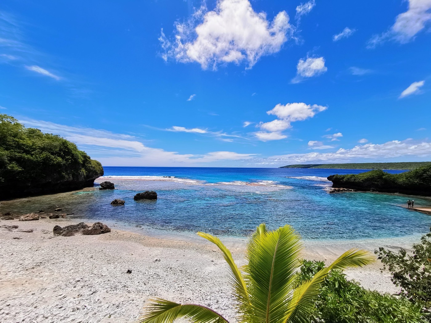 A coral cove with clear water in the Pacific islands